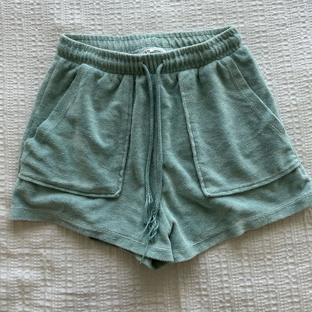 Zara shorts in size small and in the colour green/teal.